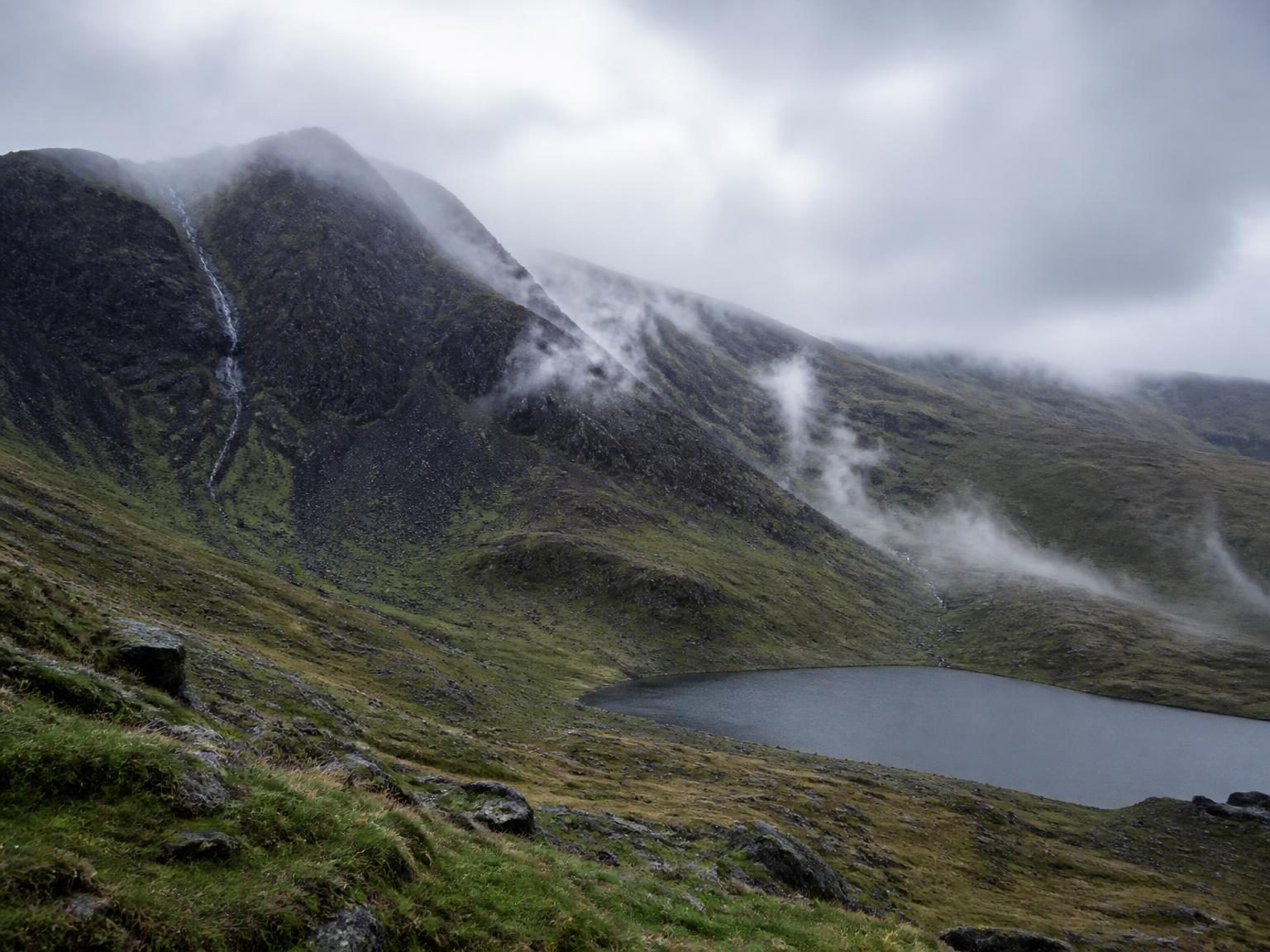 Mist drifting over wet Welsh mountains